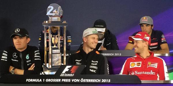 Nico Hulkenberg proudly flaunts his Le Mans trophy at the 2015 Austrian GP