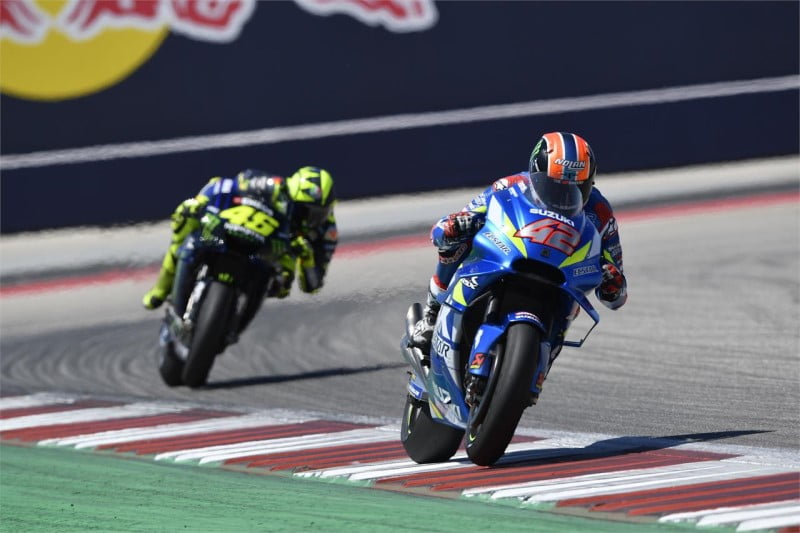 Yamaha's Valentino Rossi chases Suzuki's Alex Rins in the 2019 America MotoGP race