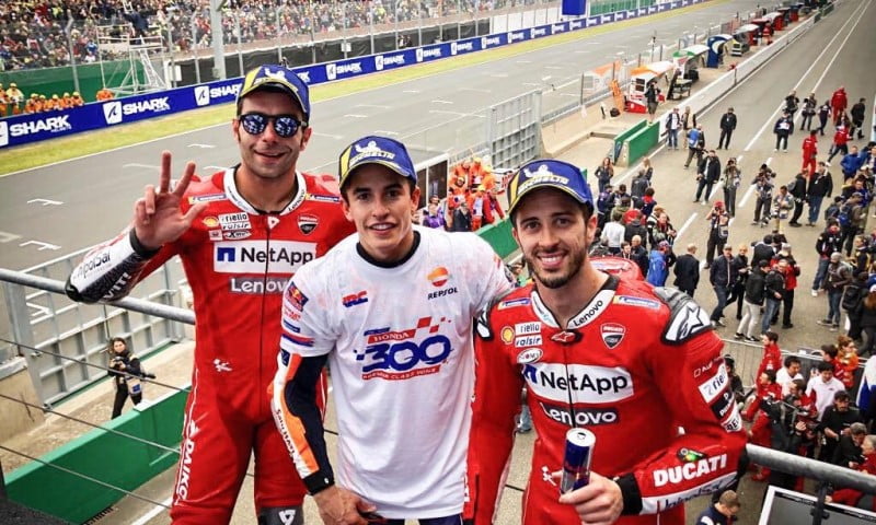 Marc Marquez and Andrea Dovizioso on the MotoGP podium at Le Mans in France 2019
