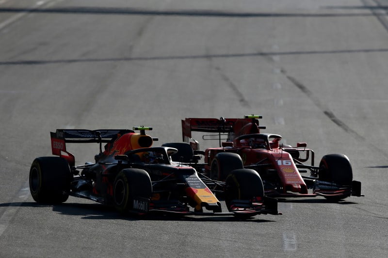 Red Bull Racing's Max Verstappen fighting Ferrari's Charles Leclerc in F1 2019