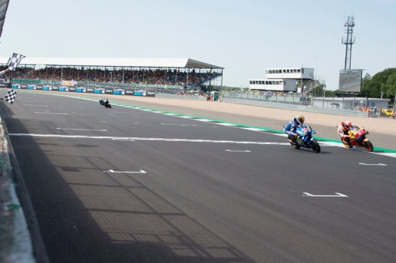 Suzuki's Alex Rins overtakes Honda's Marc Marquez - 2019 British MotoGP (courtesy: Twitter)