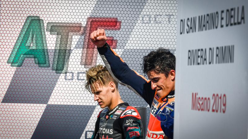 Fabio Quartararo stands atop the podium of the 2019 San Marino MotoGP after being beaten on the last lap by Marc Marquez