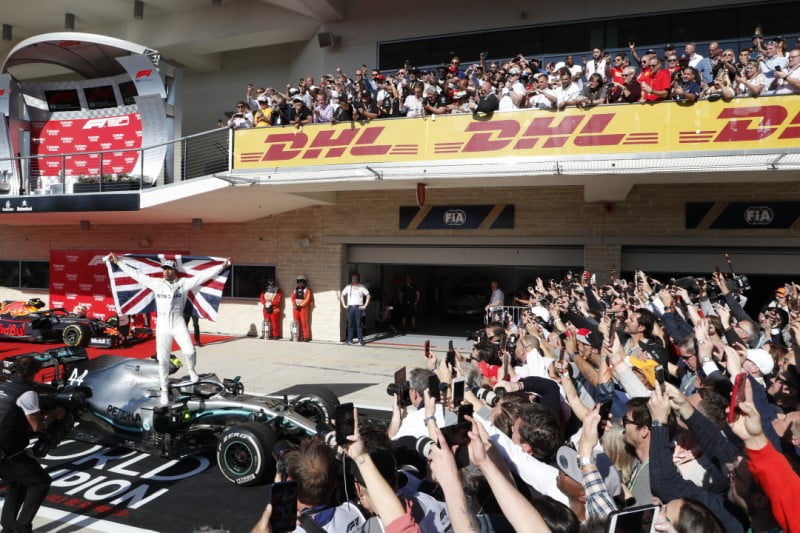 Lewis Hamilton celebrates his 6th F1 World Championship - an event that was covered live by pay TV networks contracted by F1