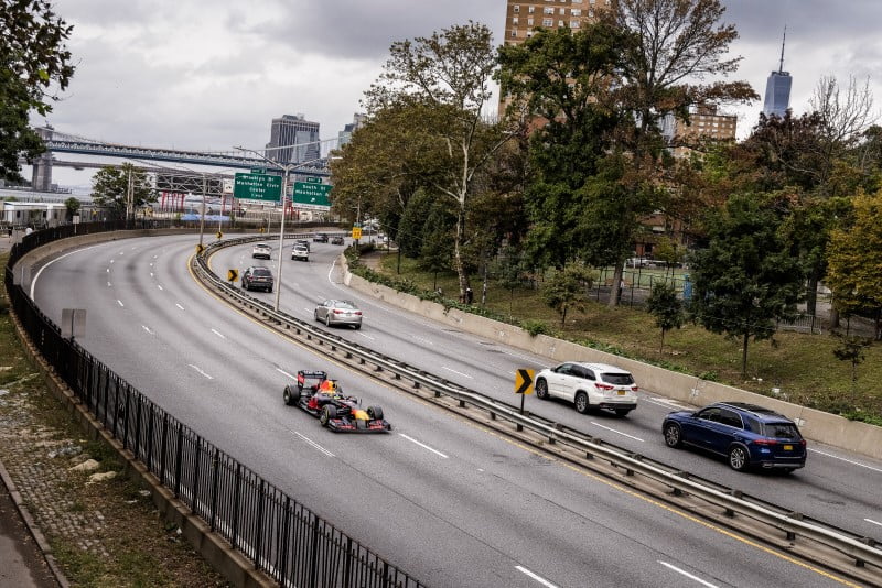 A Red Bull F1 car races down the Hudson River while promoting the second US F1 Grand Prix at Miami in 2022