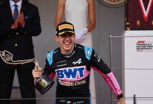 Esteban Ocon celebrates his F1 podium finish in Monaco for Alpine.
